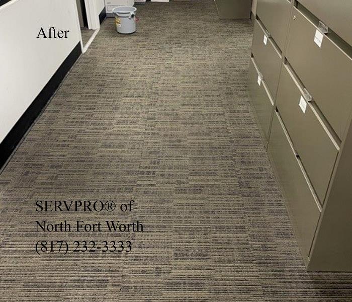 Tan commercial carpet floor after cleaning.