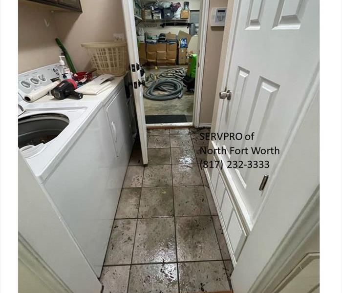 image containing indoor tile floor laundry room